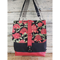 Large convertible black canvas/red leather Satchel with Waratah Panel