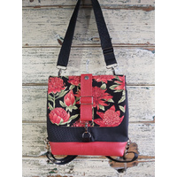 Small convertible black canvas/red leather Satchel with Waratah Panel